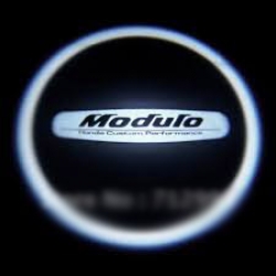 Подсветка логотипа в двери Modulo,подсветка дверей с логотипом Modulo,Штатная подсветка Modulo,подсветка дверей с логотипом авто Modulo,светодиодная подсветка логотипа Modulo в двери,Лазерные проекторы Modulo в двери,Лазерная подсветка Modulo