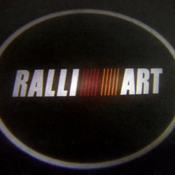 Подсветка логотипа в двери Ralli Art,подсветка дверей с логотипом Ralli Art,Штатная подсветка Ralli Art,подсветка дверей с логотипом авто Ralli Art,светодиодная подсветка логотипа Ralli Art в двери,Лазерные проекторы Ralli Art в двери,Лазерная подсветка R