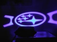 проектор на бампер SUBARU,проектор логотипа SUBARU для заднего бампера,проектор логотипа SUBARU на задний бампер,светодиодный проектор SUBARU,светодиодный проектор логотипа chevrolet,рекламный проектор SUBARU,след тени логотипа автомобиля SUBARU,светящийс