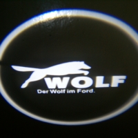 Подсветка логотипа в двери WOLF,подсветка дверей с логотипом WOLF,Штатная подсветка WOLF,подсветка дверей с логотипом авто WOLF,светодиодная подсветка логотипа WOLF в двери,Лазерные проекторы WOLF в двери,Лазерная подсветка WOLF